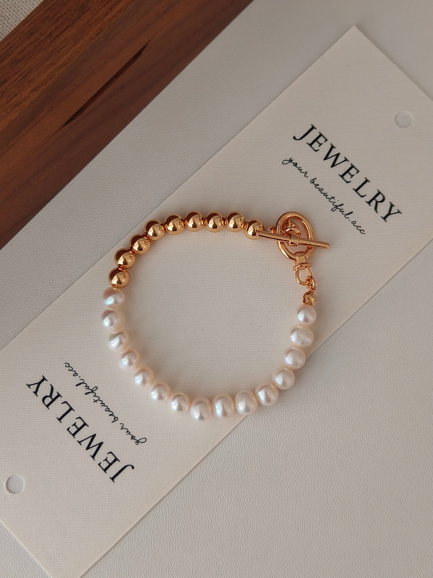 Golden Sphere & Pearl Charm Bracelet