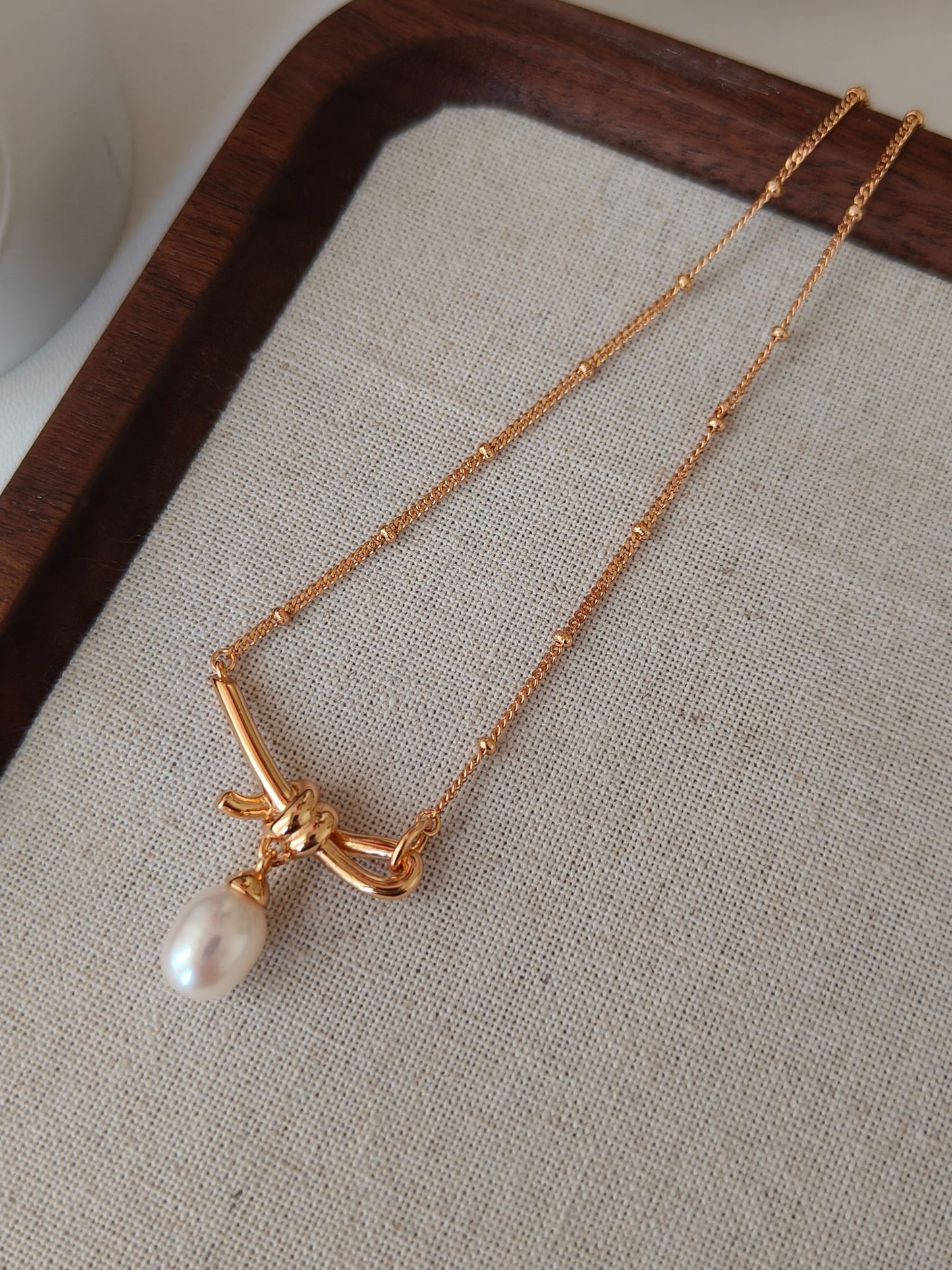 Bowtie Pearl Necklace