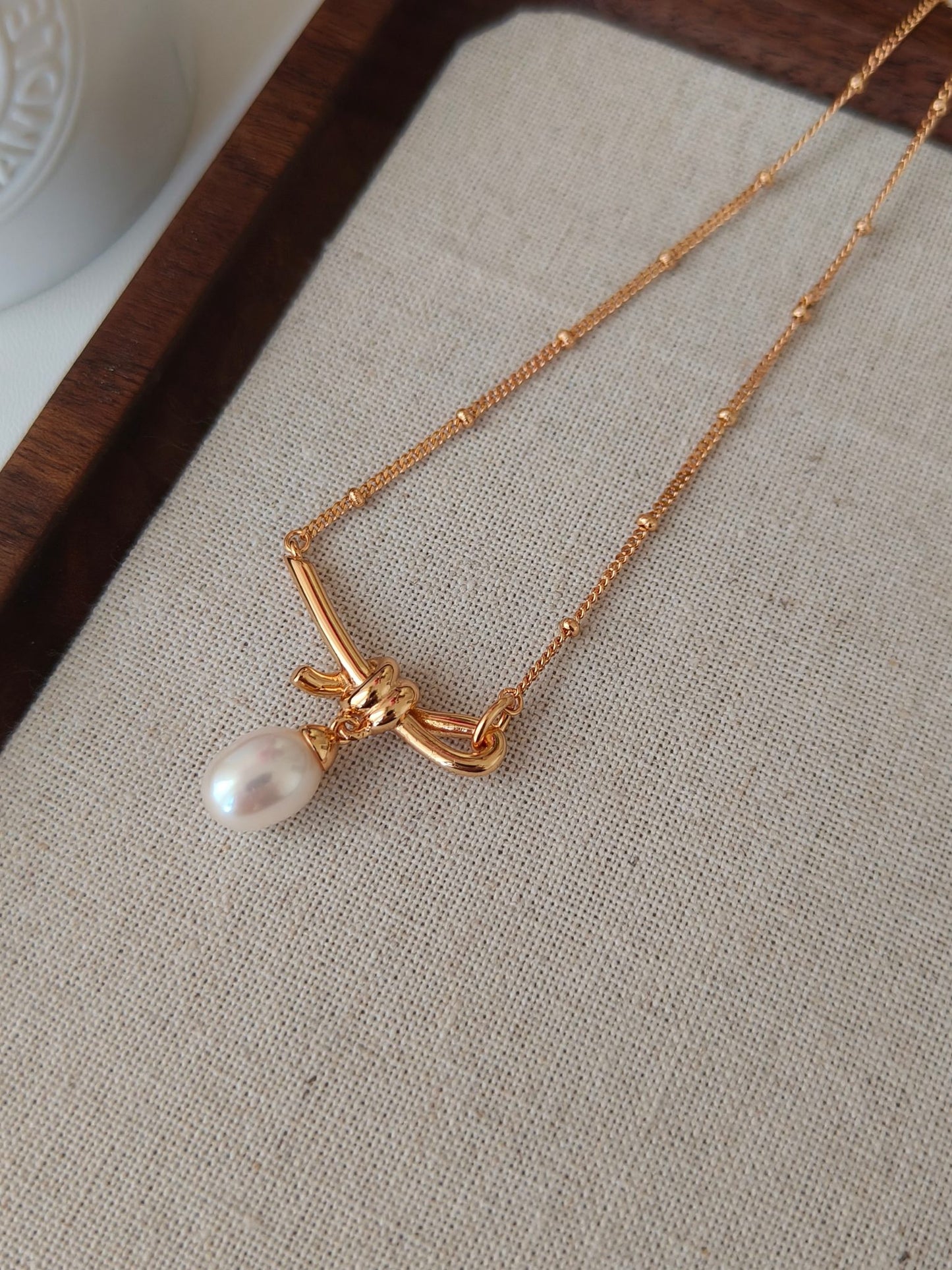 Bowtie Pearl Necklace